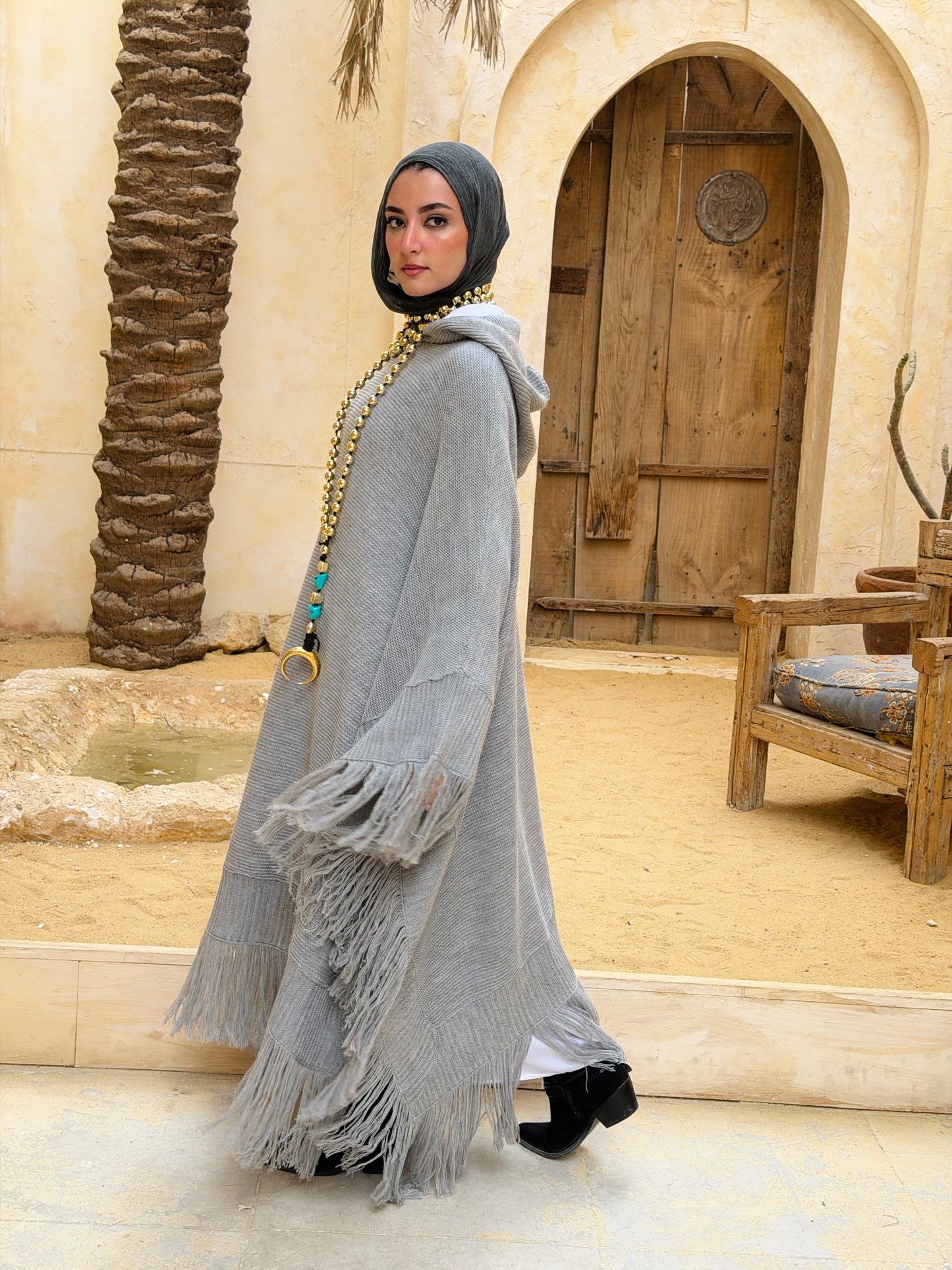 نَفَس — Nafas
Tassel Knitted Cape in Grey