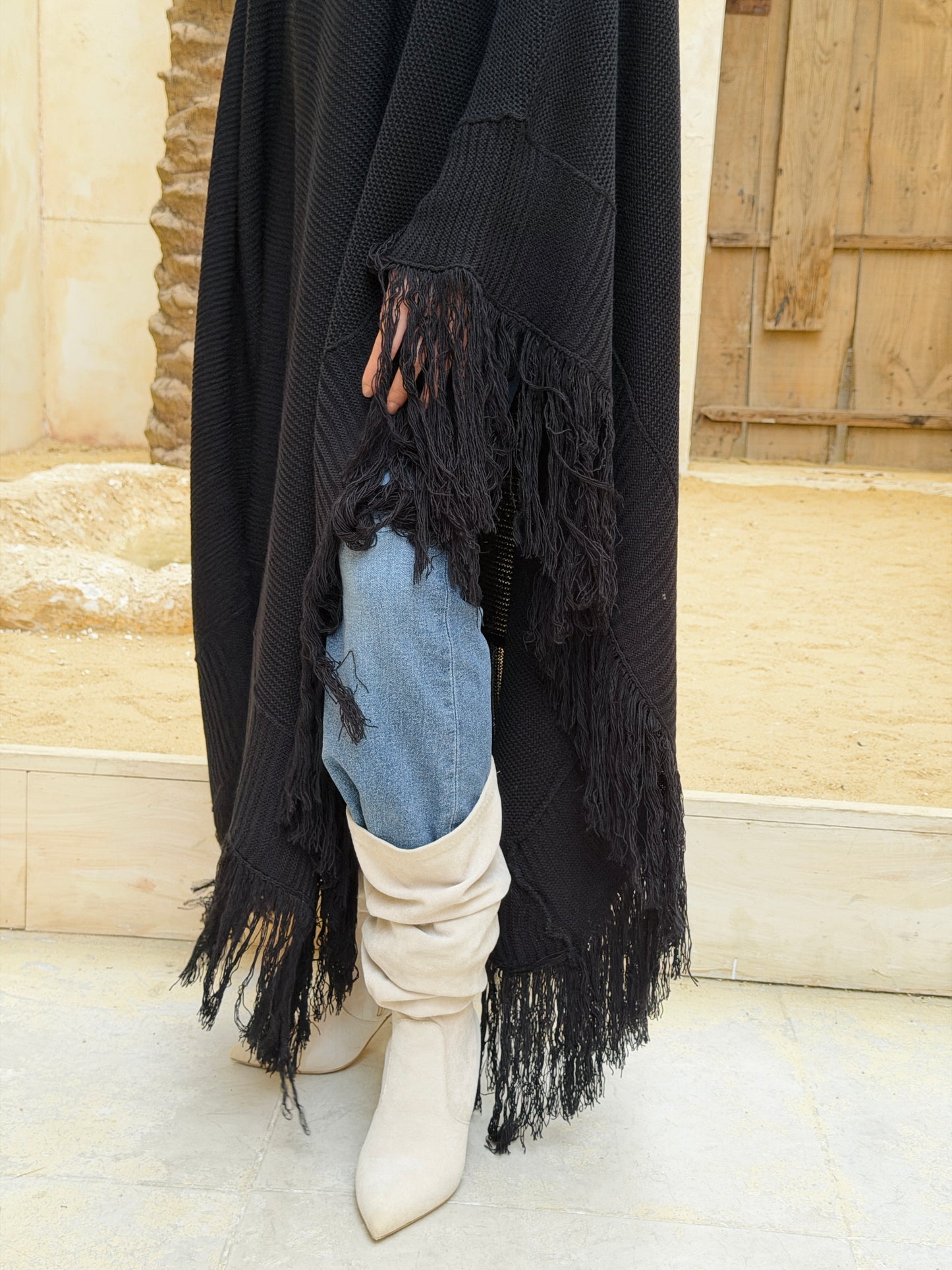 نَفَس — Nafas
Tassel Knitted Cape in black