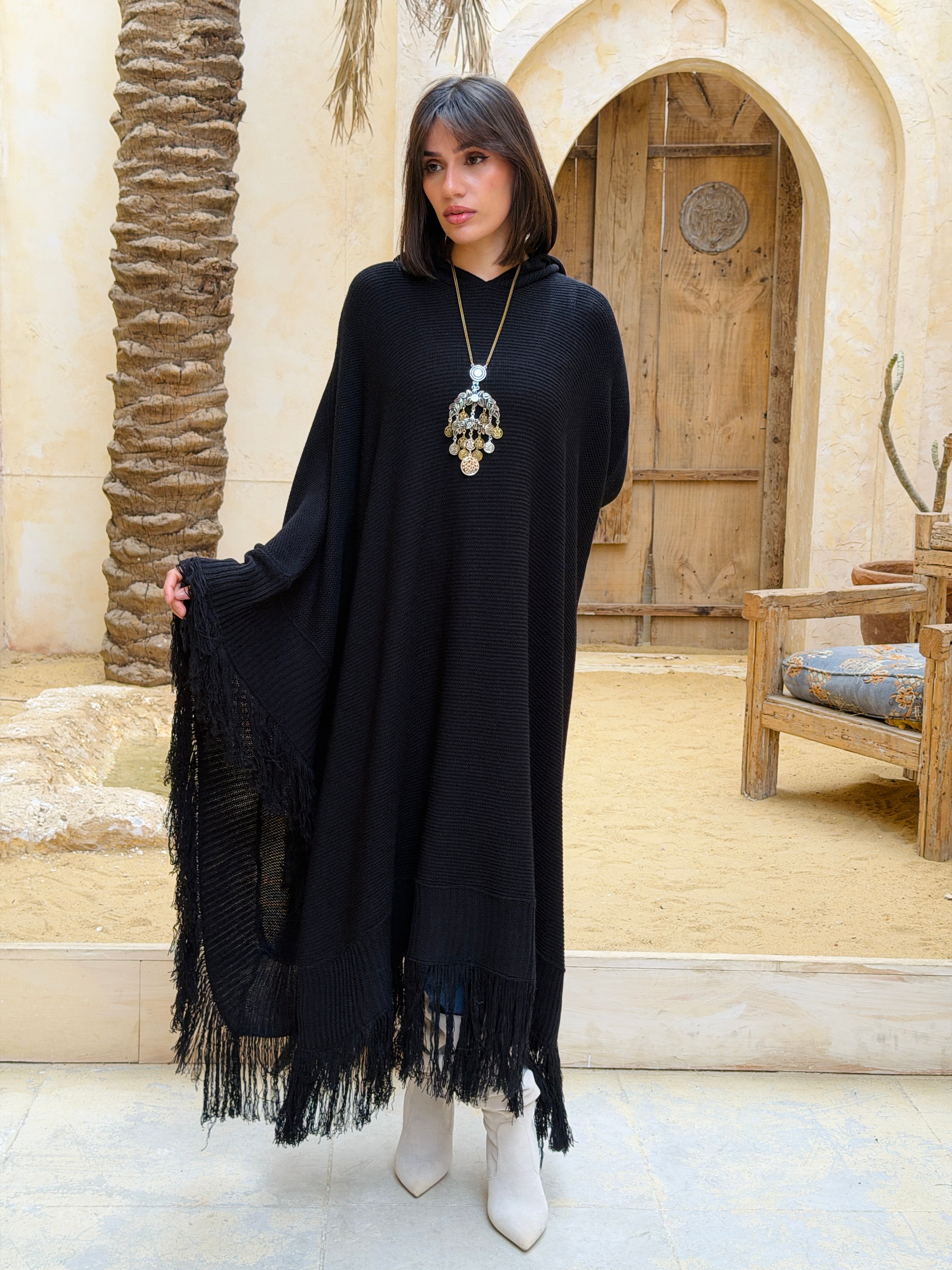نَفَس — Nafas Tassel Knitted Cape in black – Mazzarat