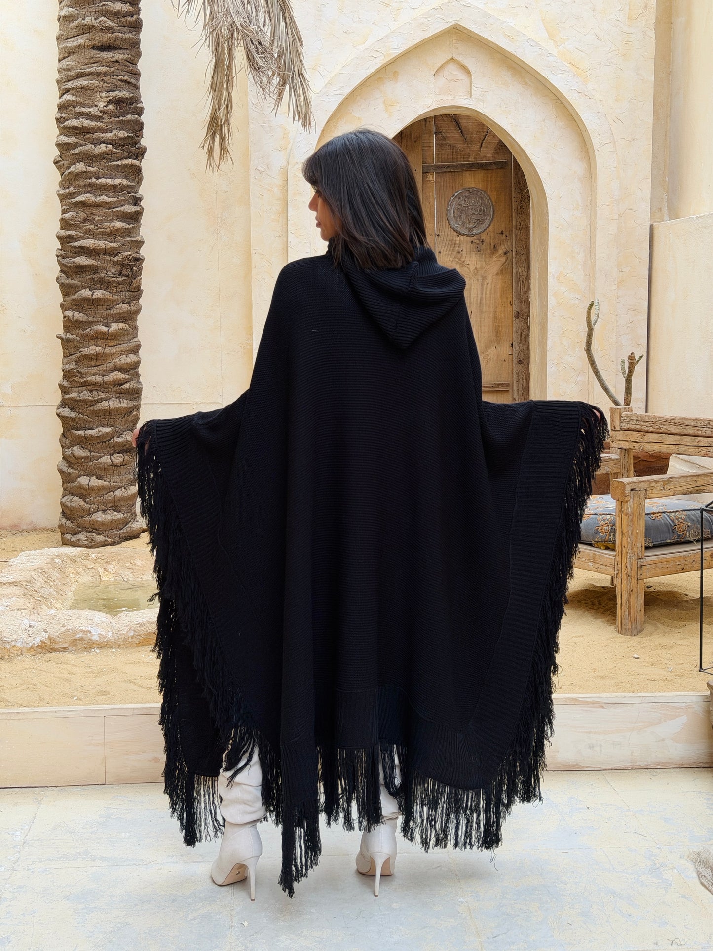 نَفَس — Nafas
Tassel Knitted Cape in black