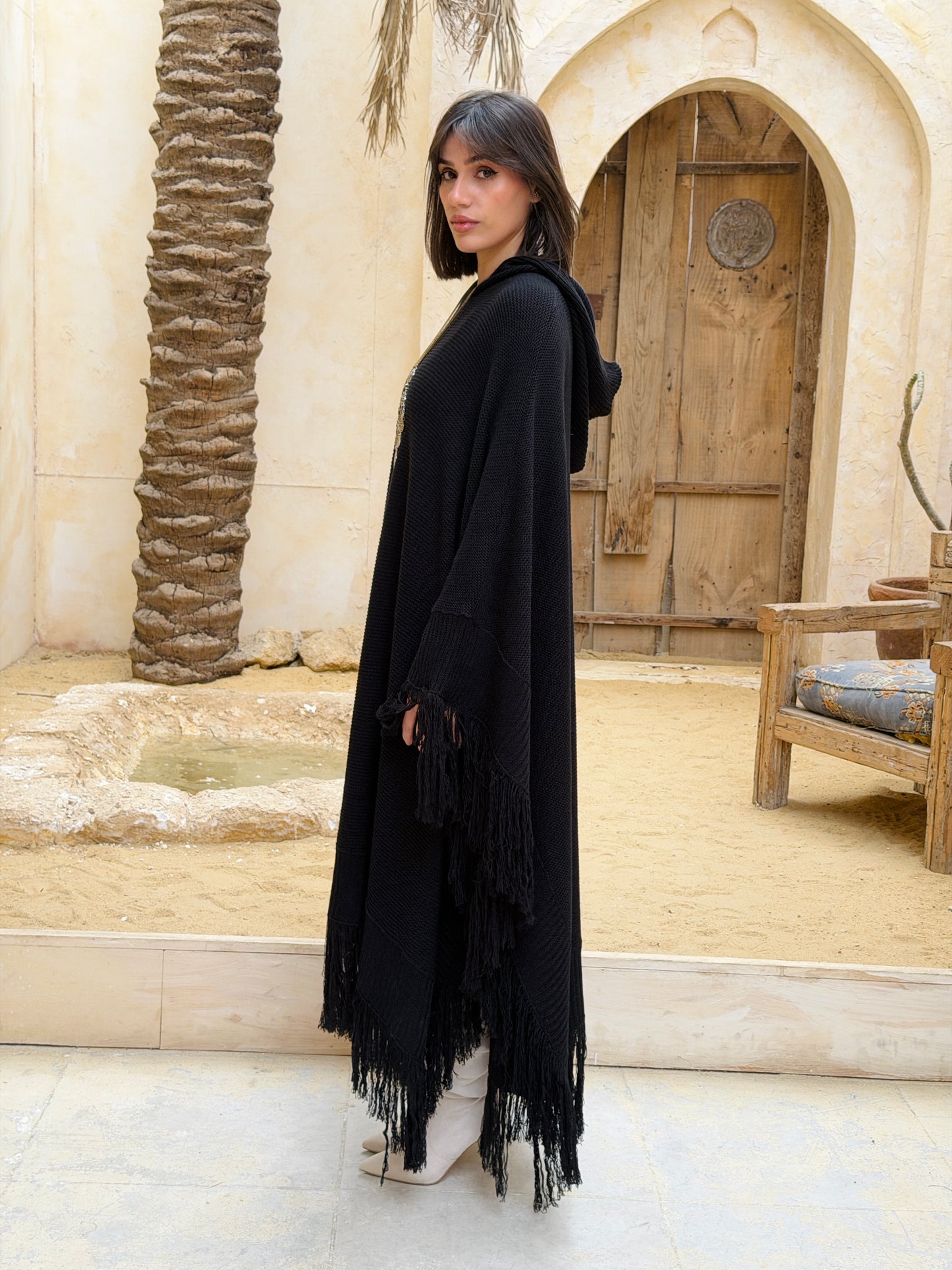 نَفَس — Nafas
Tassel Knitted Cape in black