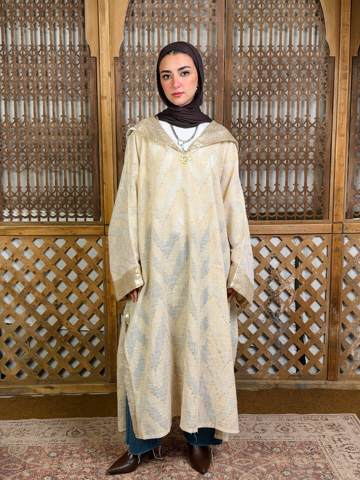 نُقْيَة — Noqya
Linen golden Kaftan