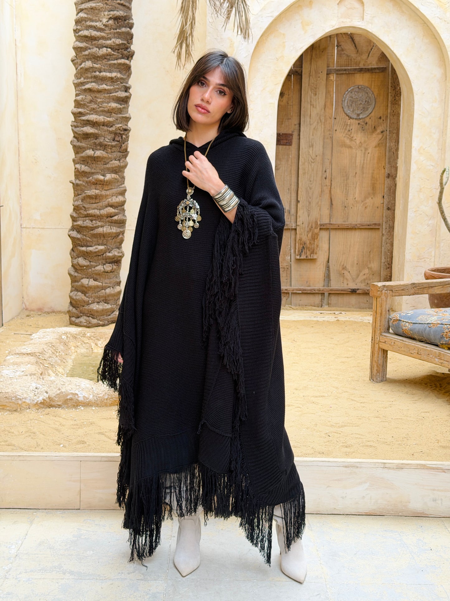 نَفَس — Nafas
Tassel Knitted Cape in black