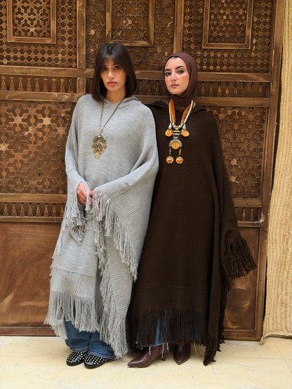 نَفَس — Nafas
Tassel Knitted Cape in Grey
