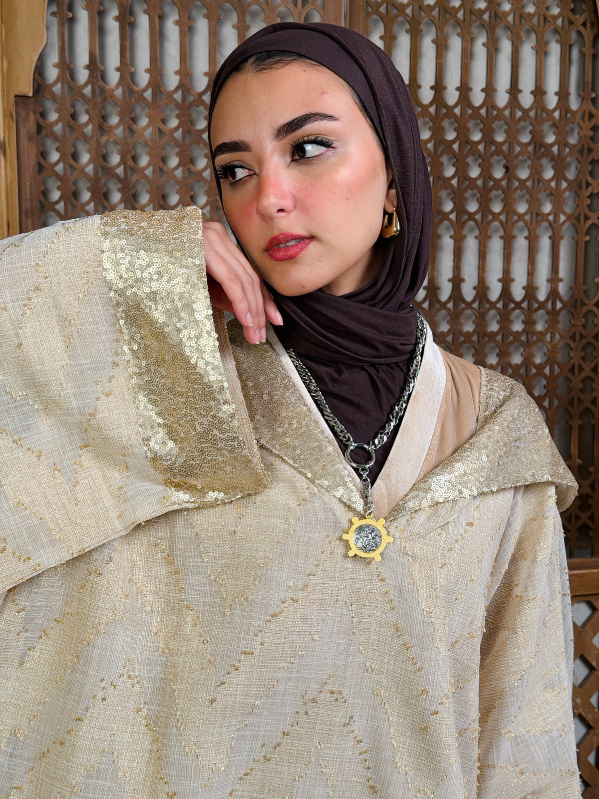 نُقْيَة — Noqya
Linen golden Kaftan