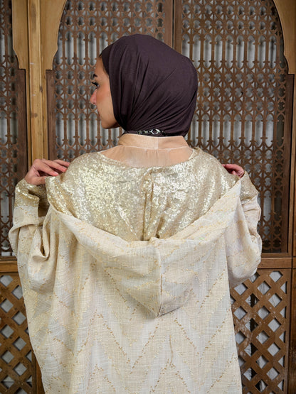 نُقْيَة — Noqya
Linen golden Kaftan