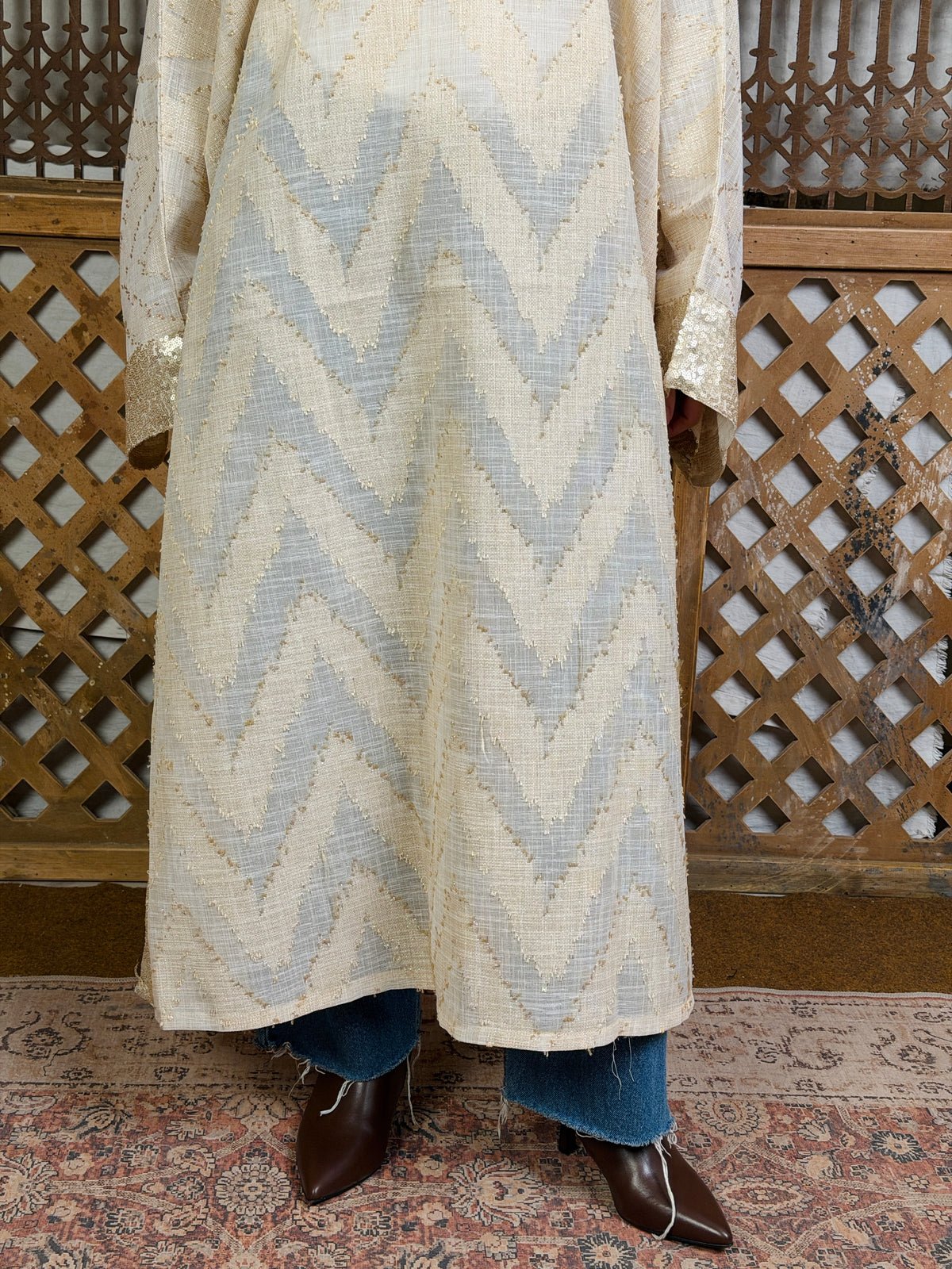 نُقْيَة — Noqya
Linen golden Kaftan