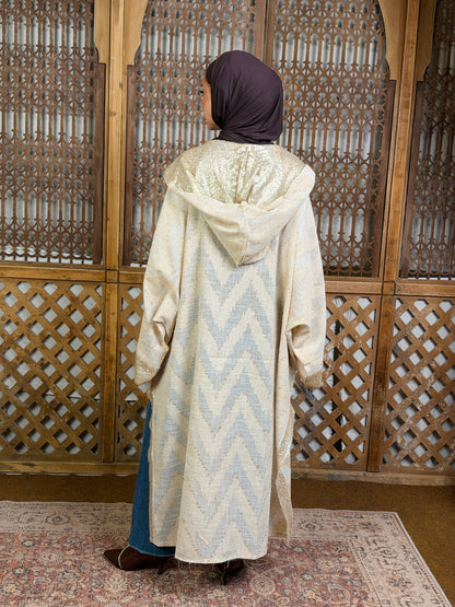 نُقْيَة — Noqya
Linen golden Kaftan