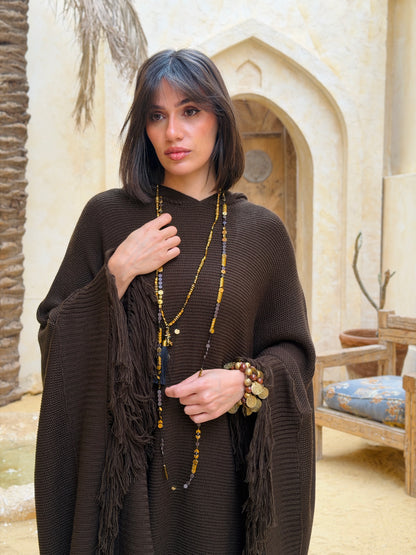 نَفَس — Nafas
Tassel Knitted Cape in brown