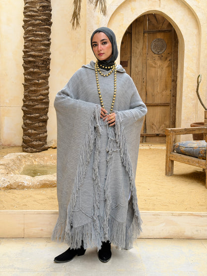 نَفَس — Nafas
Tassel Knitted Cape in Grey