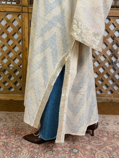 نُقْيَة — Noqya
Linen golden Kaftan