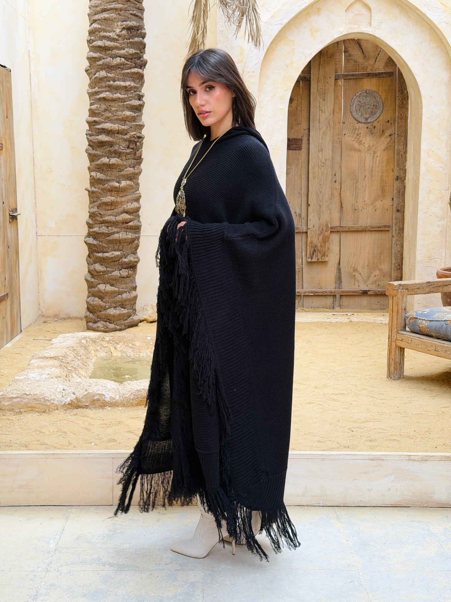 نَفَس — Nafas
Tassel Knitted Cape in black