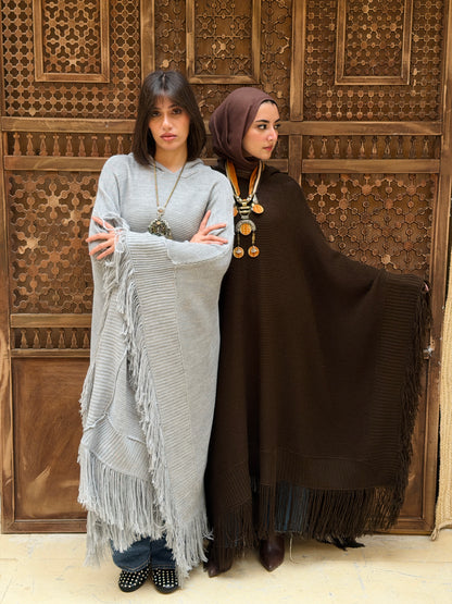 نَفَس — Nafas
Tassel Knitted Cape in Grey