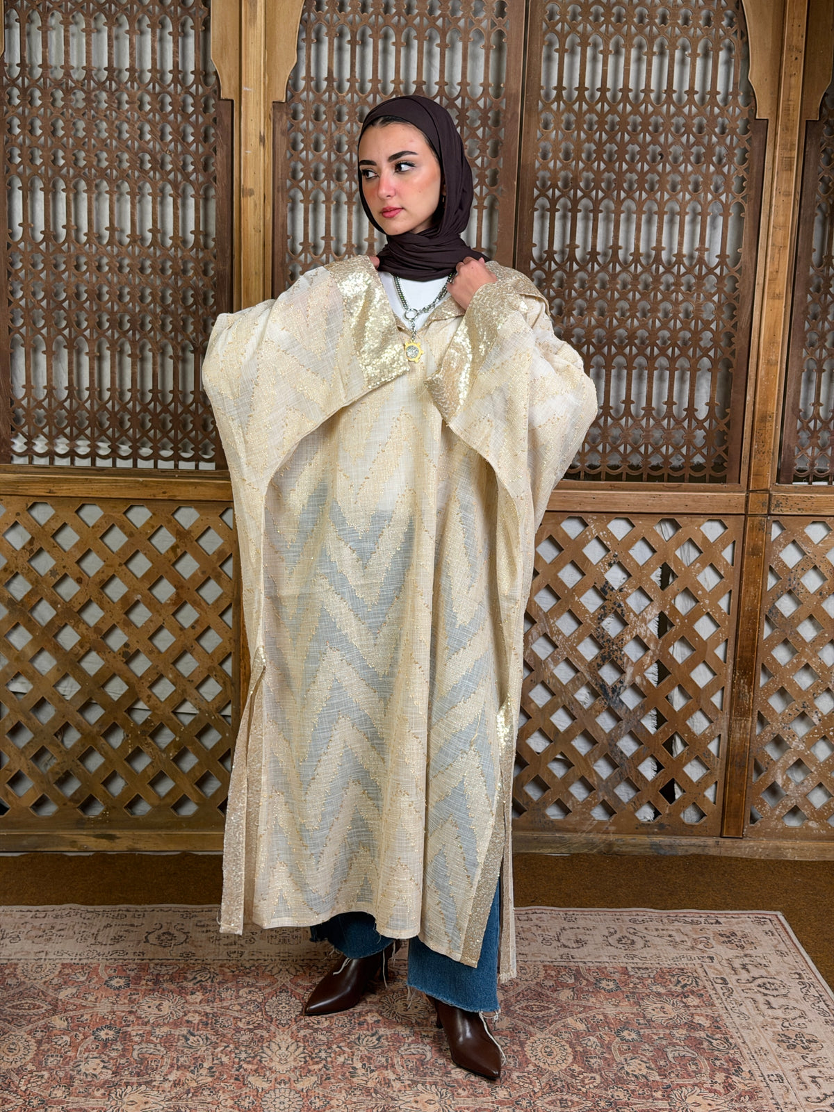 نُقْيَة — Noqya
Linen golden Kaftan