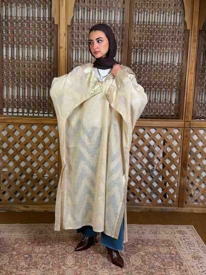 نُقْيَة — Noqya
Linen golden Kaftan