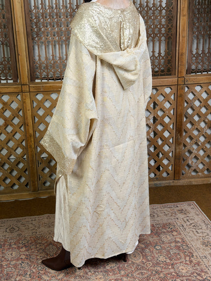 نُقْيَة — Noqya
Linen golden Kaftan