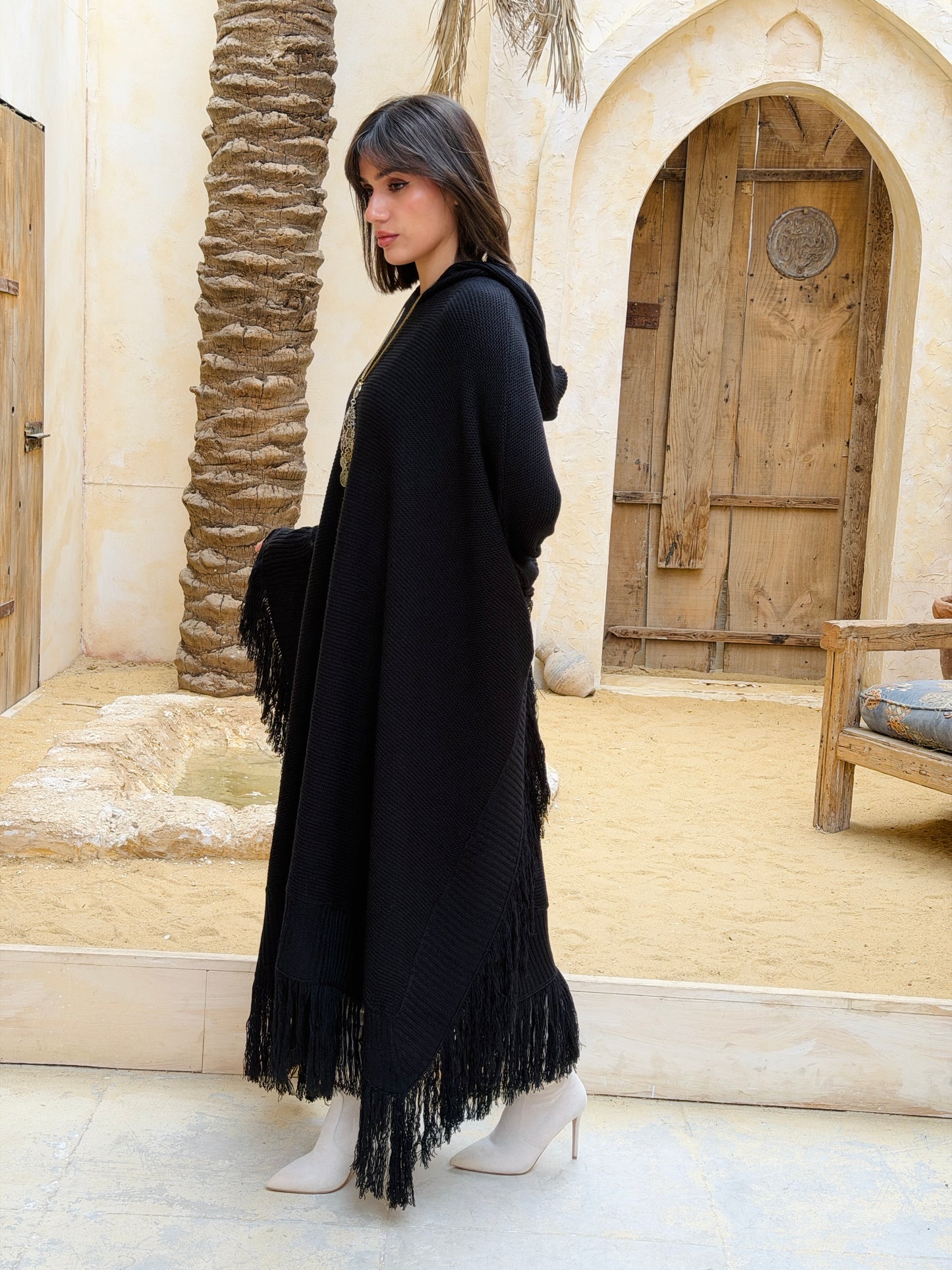 نَفَس — Nafas
Tassel Knitted Cape in black