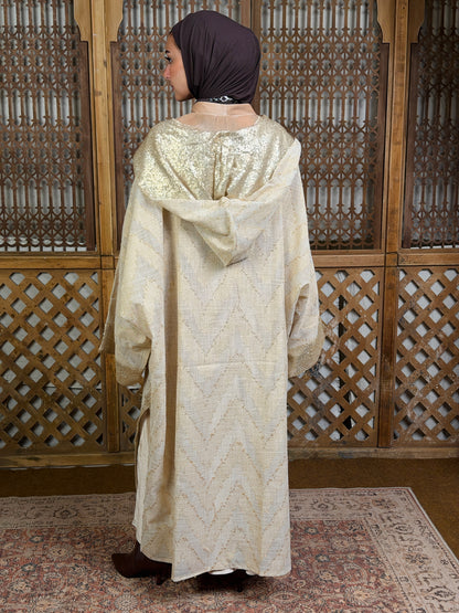 نُقْيَة — Noqya
Linen golden Kaftan