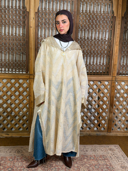 نُقْيَة — Noqya
Linen golden Kaftan