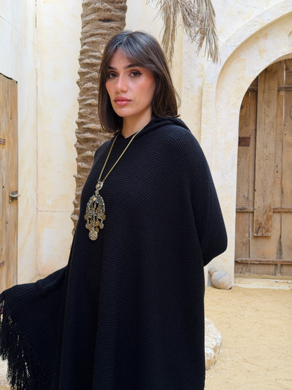 نَفَس — Nafas
Tassel Knitted Cape in black