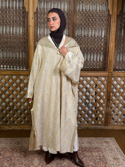 نُقْيَة — Noqya
Linen golden Kaftan