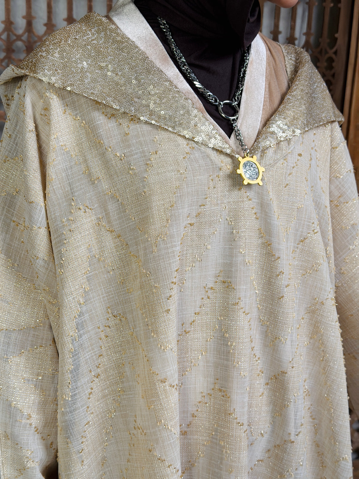 نُقْيَة — Noqya
Linen golden Kaftan