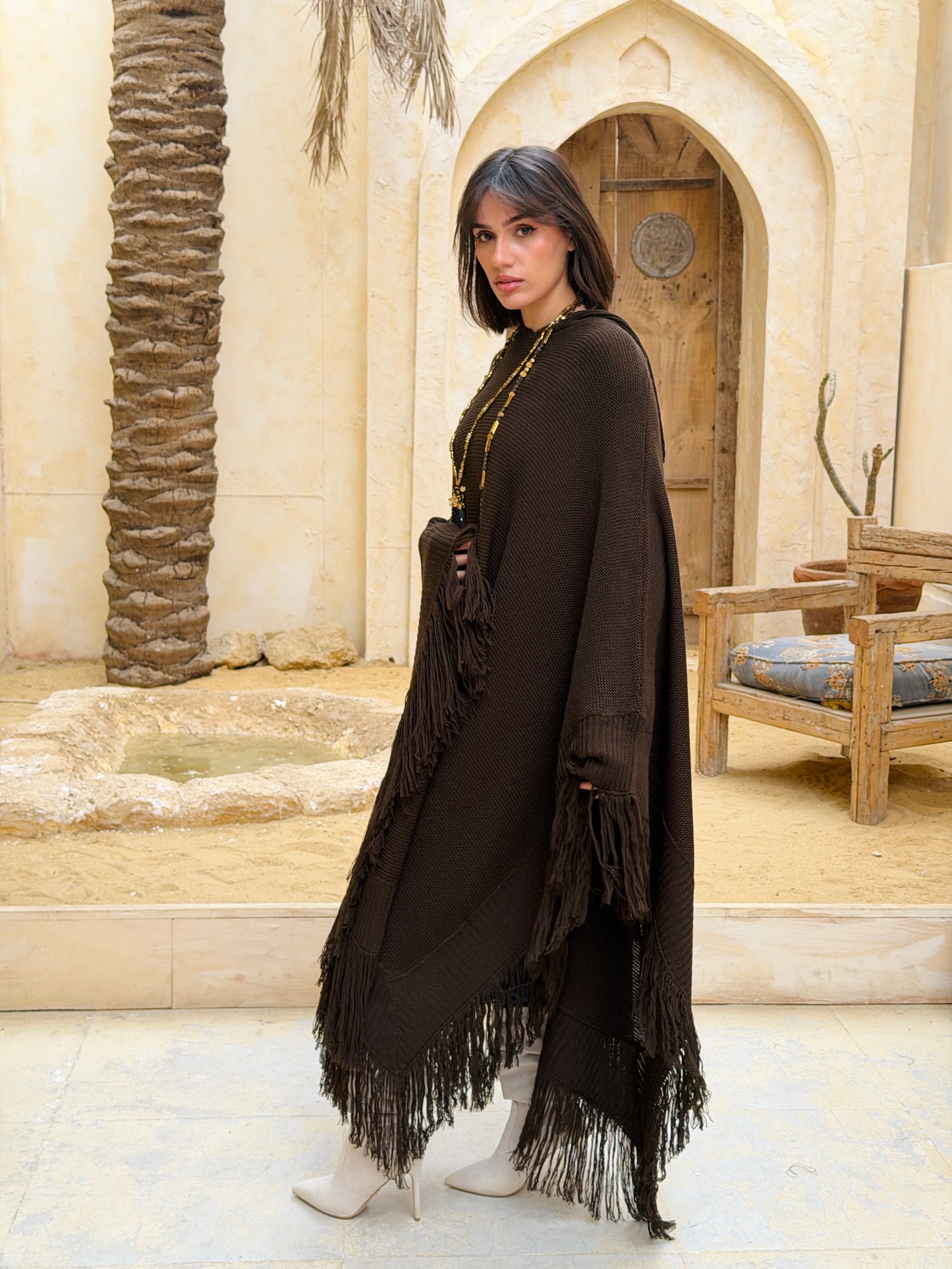 نَفَس — Nafas
Tassel Knitted Cape in brown